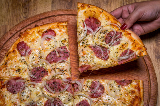 Pizza Calabresa: 14.800 Kz / 19.500 Kz